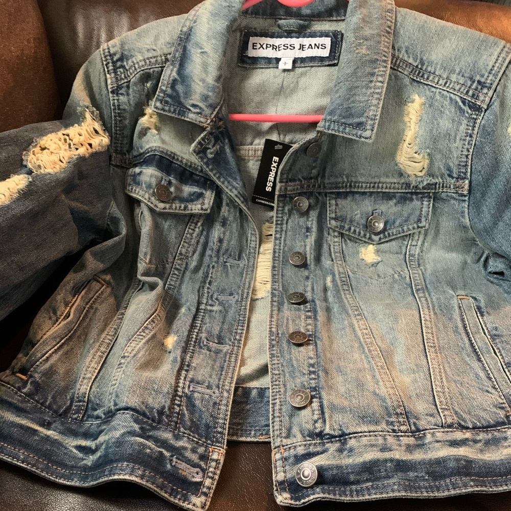 Distressed jeans jacket